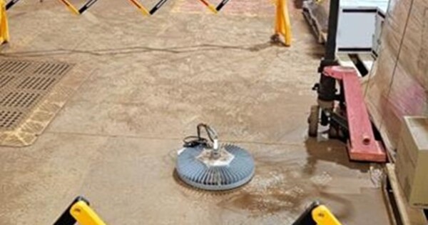 Falling light fixture narrowly misses worker